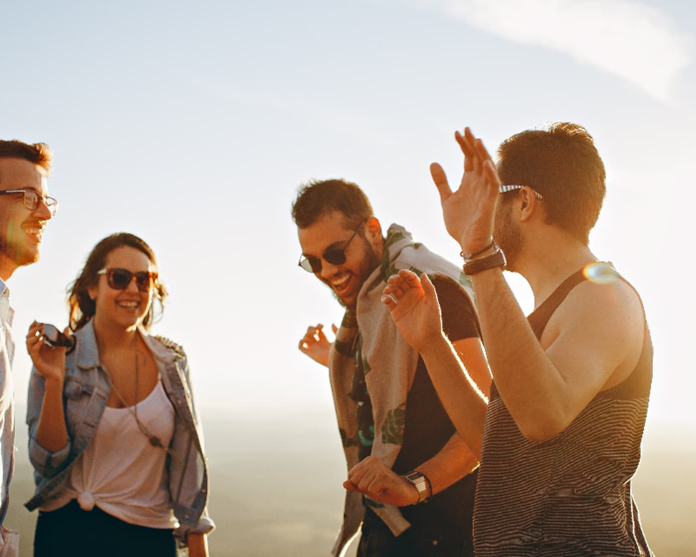Friends laughing together outdoors